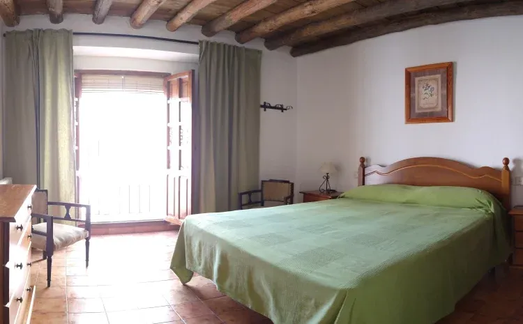 Imagen de dormitorio una cama doble 