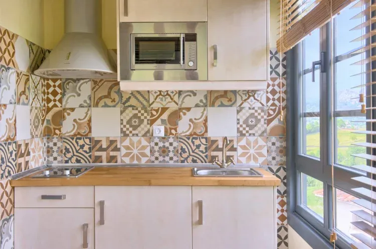 Imagen de Zona cocina estudio dos camas superior y estudio jacuzzi