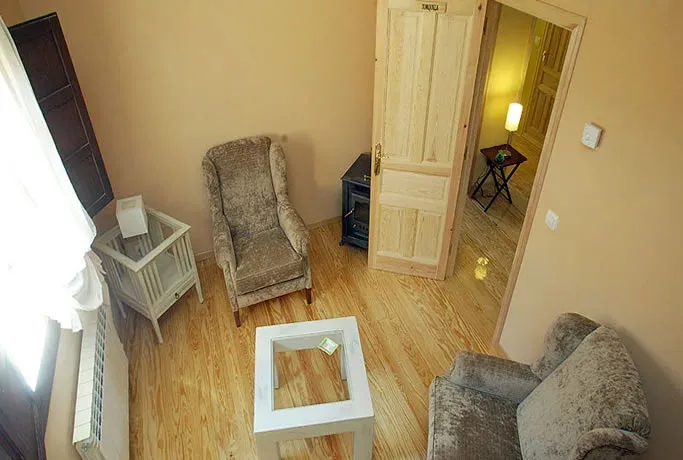 Imagen de Vista cenital del salón de un  dúplex.