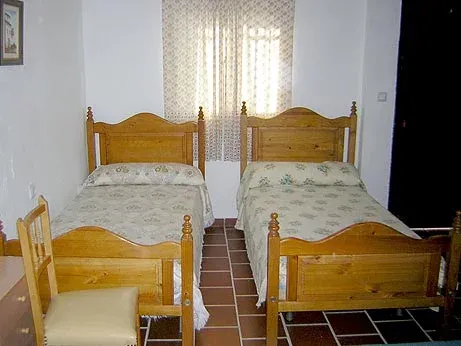 Imagen de habitación con tres camas individuales
