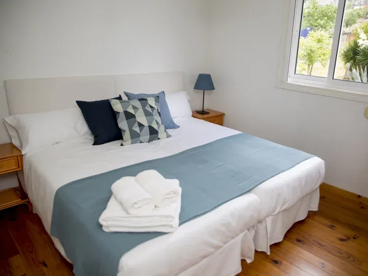 Imagen de Habitación doble acogedora con cama cómoda en A Casiña.
