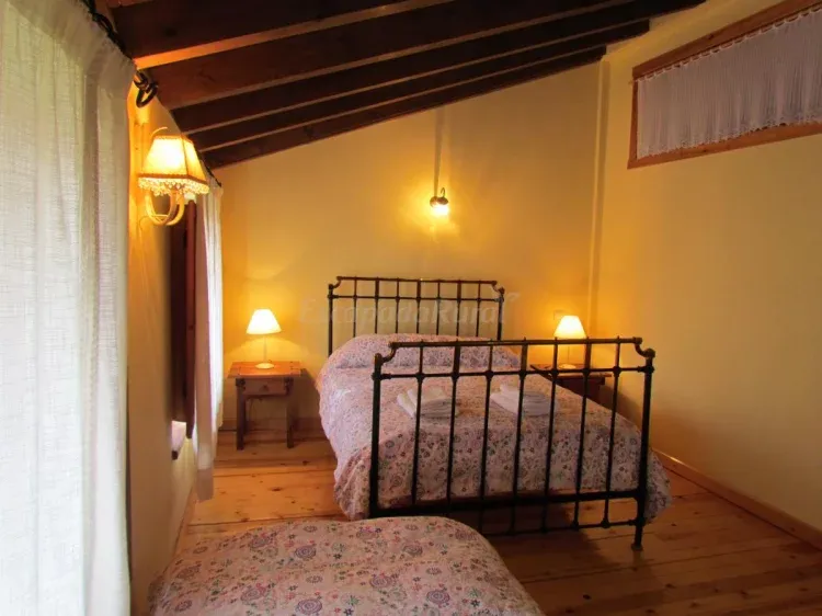 Imagen de Casa Rural de Gredos Piedra del Mediodía habitación las Eras con supletoria