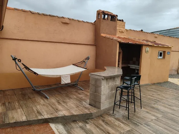 Imagen de Zona de barbacoa y barra bar