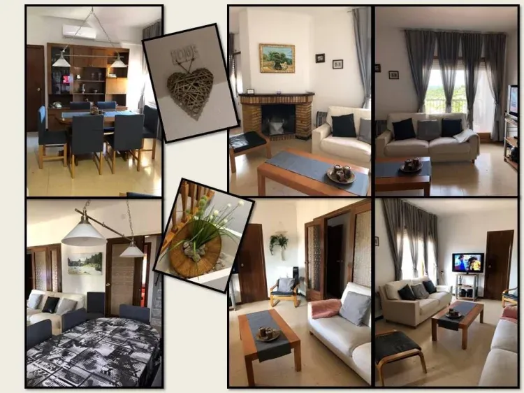 Imagen de Salon comedor con chimenea y aire acondicionado